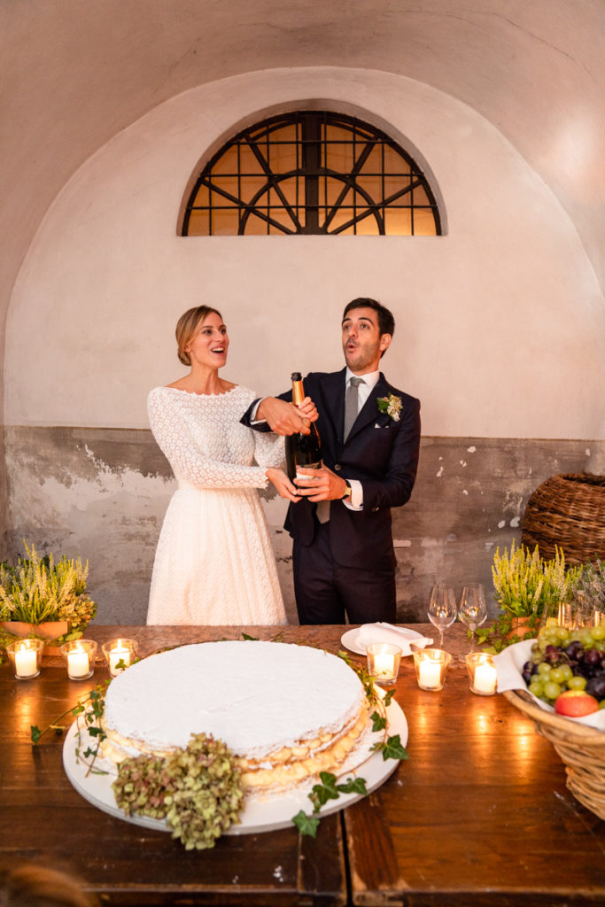 fotografo matrimonio reportage top servizio foltografico Trento Italia cena candele atmosfera villa dimora antica allestimento brindisi lusso eleganza torta nuziale prosecco champagne lusso 