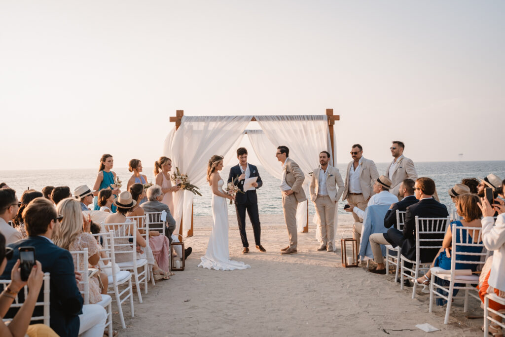 wedding, photographer, Dubai, beach, cerimony, bride, dress, inspiration, palm, reportage, colors, bouquet, flowers, planner, emotions, groom, gazebo, bridemaids, groomsman, 