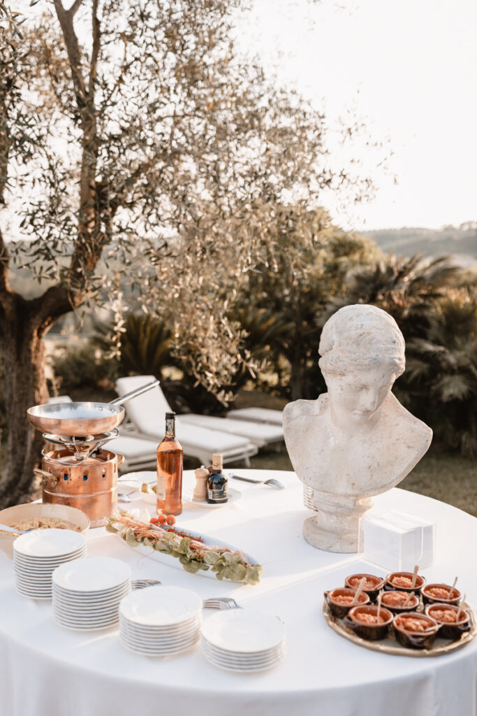 aperitive sprits after cerimony in the pool of the location during the sunset