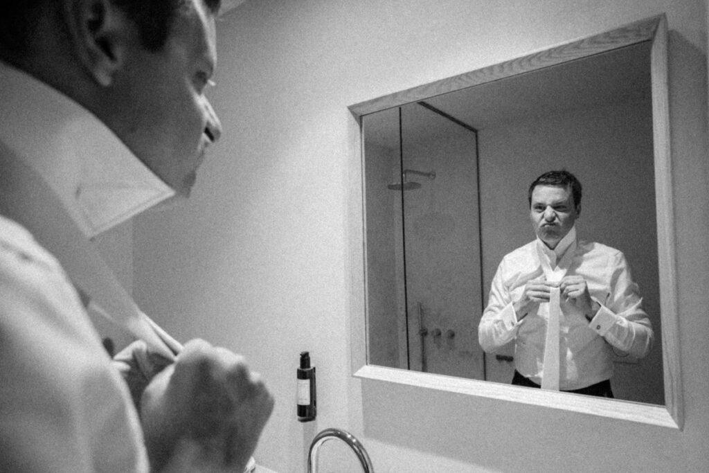 groom at the mirror