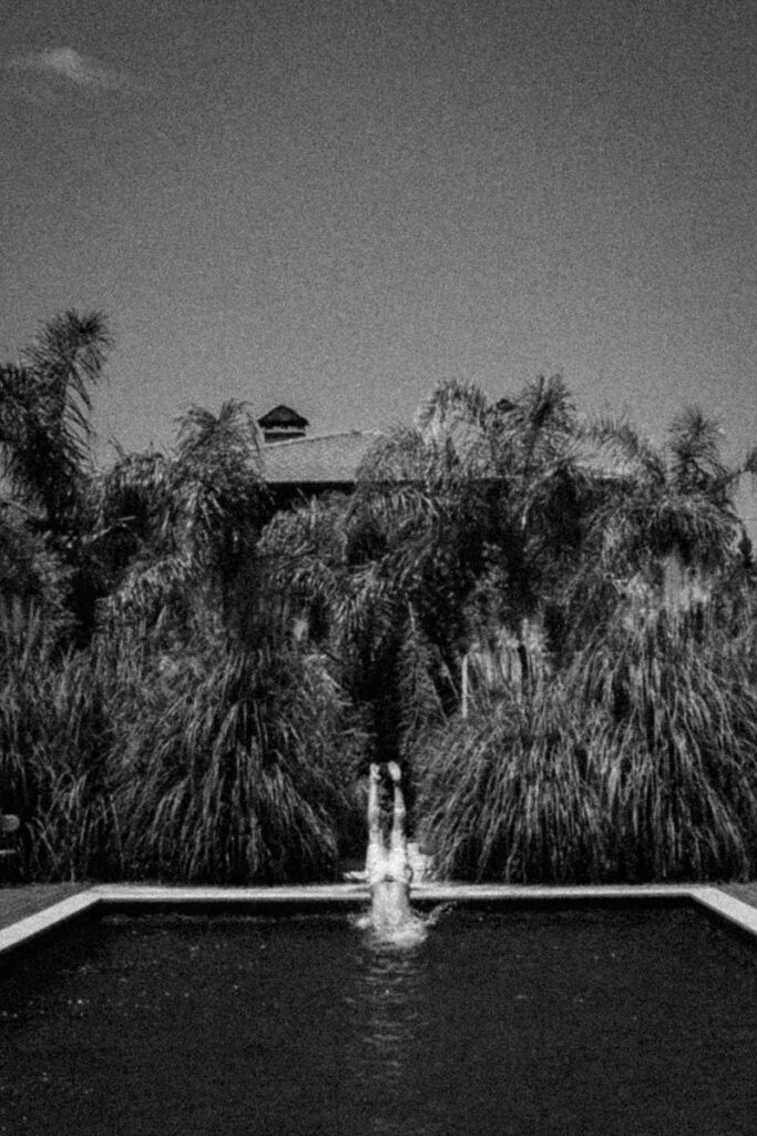 groom in the pool before the wedding