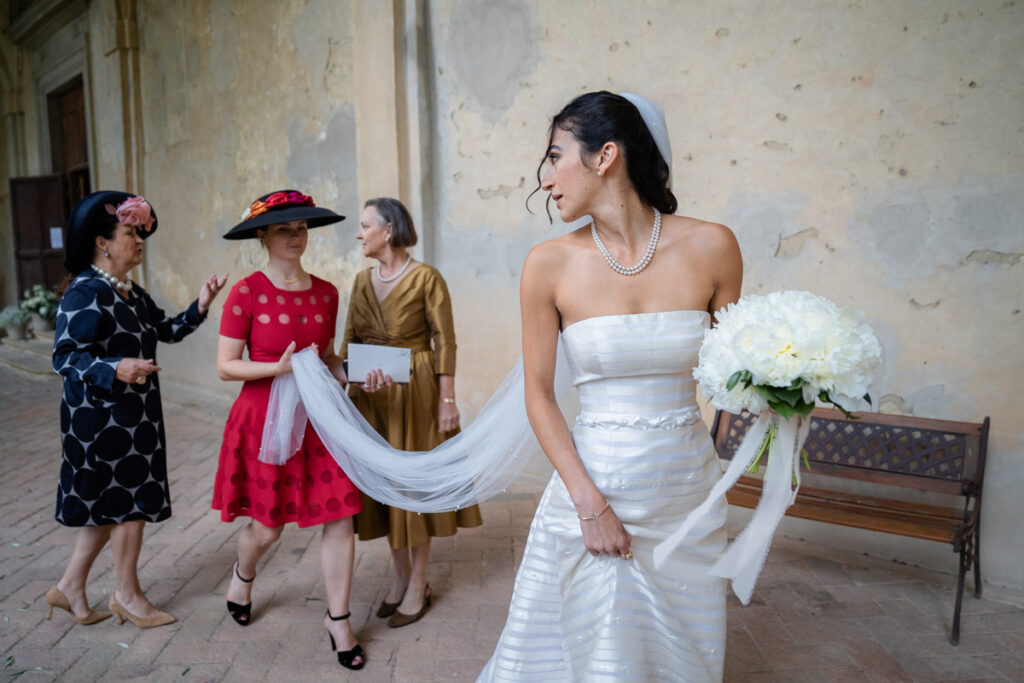 wedding photographer in Tuscany, Italy style, best wedding venue certosa di Pontignano, convento, bride dress by Peter Langner, to the cerimony