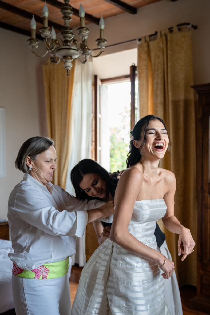 wedding photographer in Tuscany, Italian style, best venue certosa di Pontignano, convento, bride dress by Peter Langner, bride getting ready