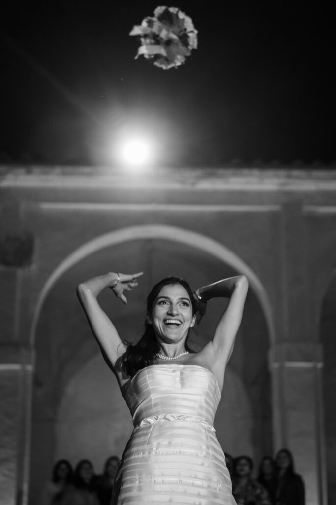 wedding photographer in Tuscany, Italy style, best wedding venue certosa di Pontignano, convento, bride dress by Peter Langner, bouquet toss