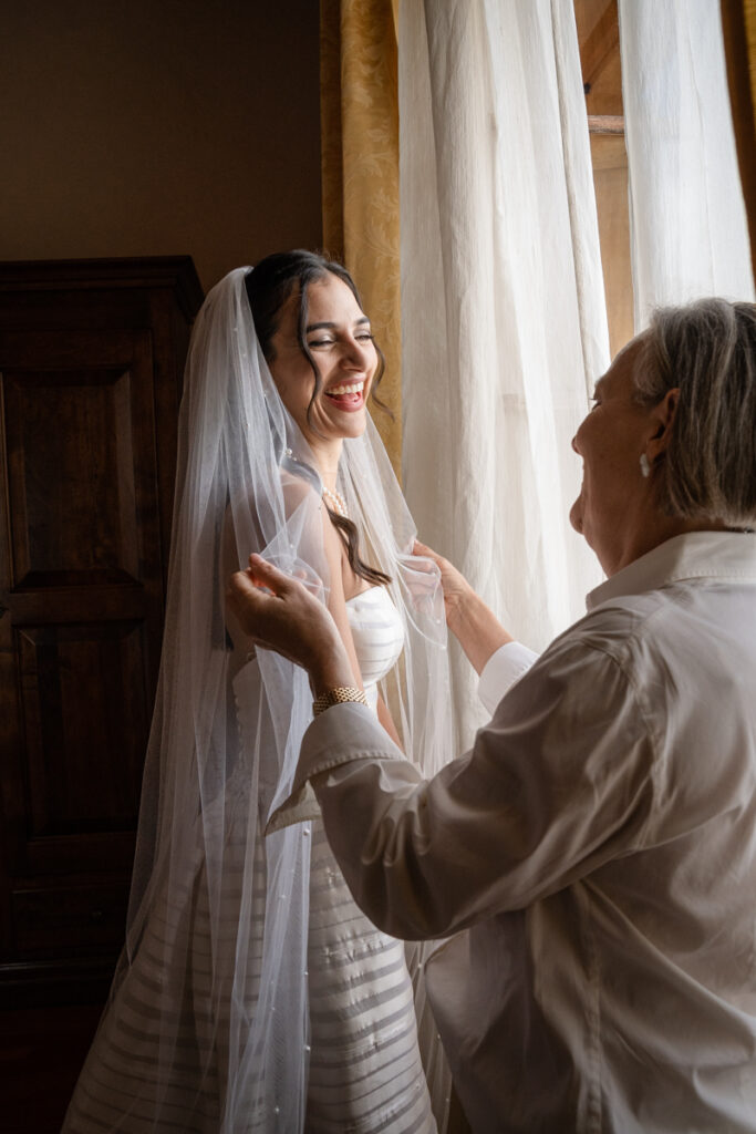 wedding photographer in Tuscany, Italy style, best venue certosa di Pontignano, convento, bride dress by Peter Langner, bride veil, family tmeless photos 