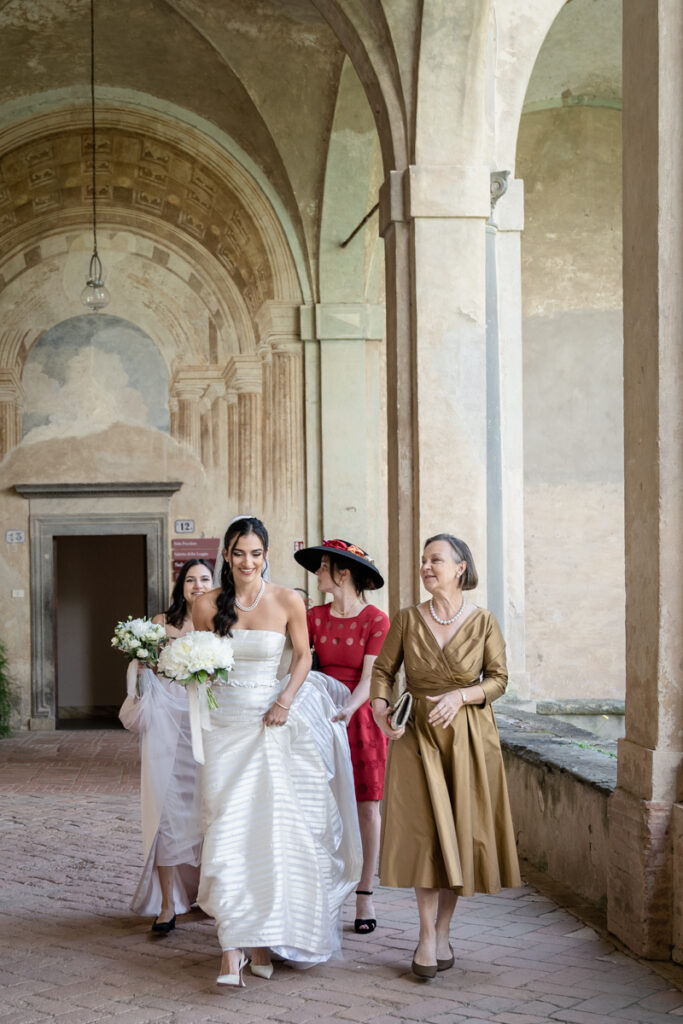 wedding photographer in Tuscany, Italy style, best wedding venue certosa di Pontignano, convento, bride dress by Peter Langner, to the cerimony