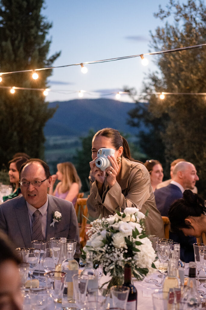 intimate wedding photogrpaher in Tuscany countryside private villa between Tuscany and Umbria, italian style, reception, polaroid